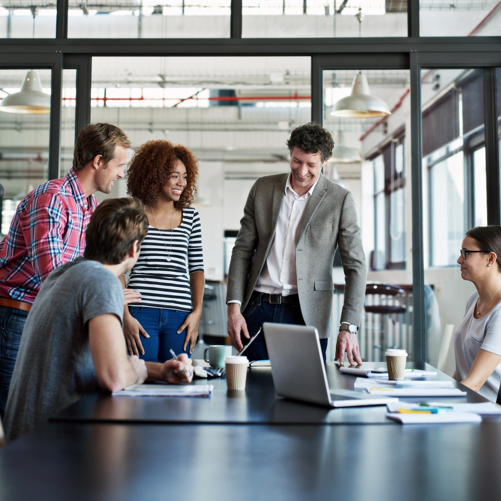 An image of an HR team planning background check strategy in Canada.