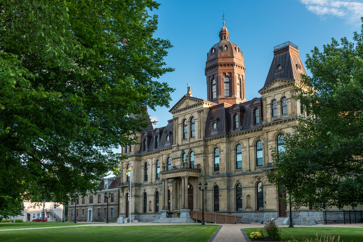 An image of the legislative building in New Brunswick representing the government data included in a Triton criminal record check in New Brunswick.