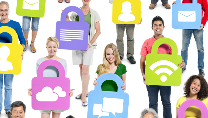 group of people holding social icons