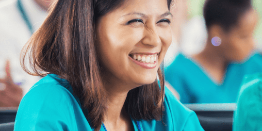 Nurse smiling due to the nursing job opportunities in Canada