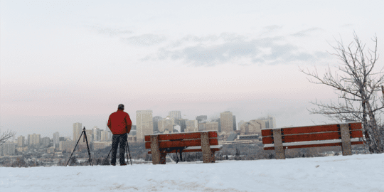 man overlooking downtown Edmonton Alberta