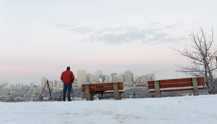 man overlooking downtown Edmonton Alberta