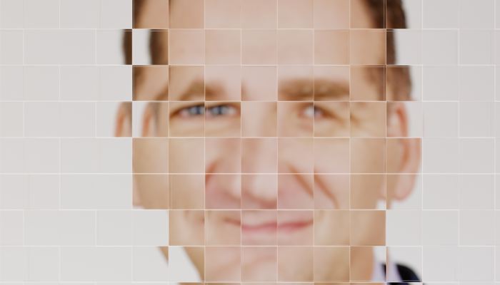 image of a face pixeled to mitigate fraud